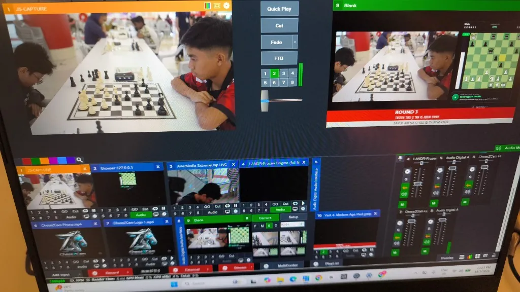 OTB chess match with laptop supporting a digital recording workflow